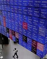 Stock market today: Asian stocks are mostly higher as Bank of Japan raises benchmark rate